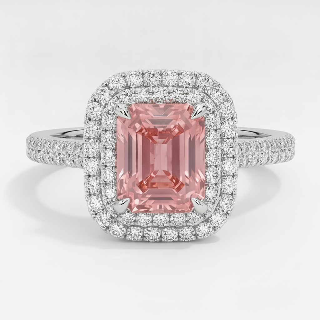 Anello con Zaffiro Padparadscha da 3,8 Carati e Doppio Halo di Smeraldi Naturali in Oro Bianco 14K