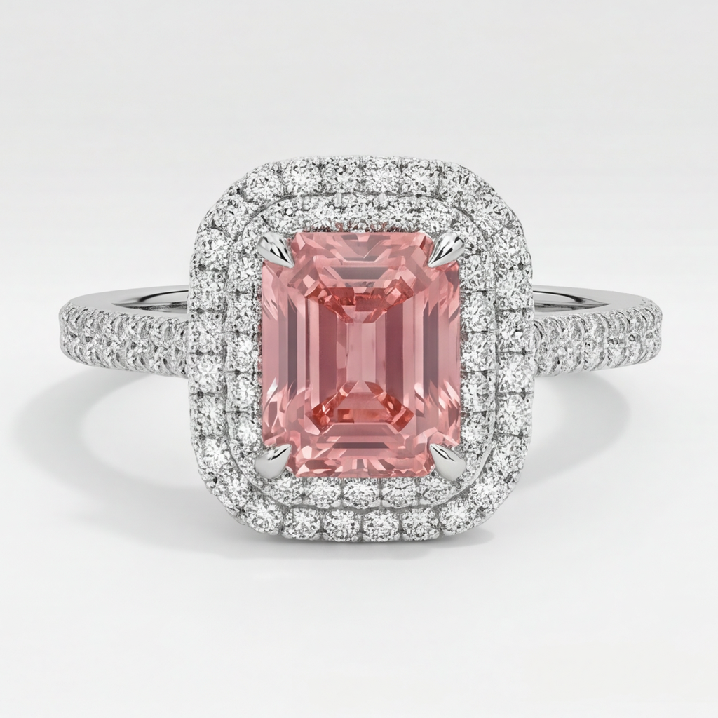 Anello con Zaffiro Padparadscha da 3,8 Carati e Doppio Halo di Smeraldi Naturali in Oro Bianco 14K