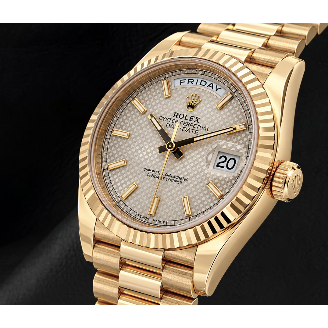 Orologio Rolex Day-Date 40 mm 228238 in Oro Giallo con Quadrante Argento con Motivo e Bracciale President