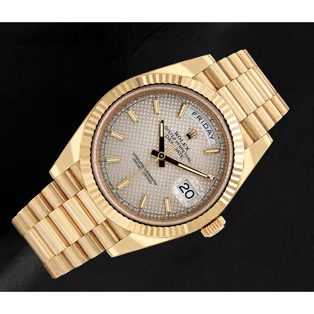 Orologio Rolex Day-Date 40 mm 228238 in Oro Giallo con Quadrante Argento con Motivo e Bracciale President