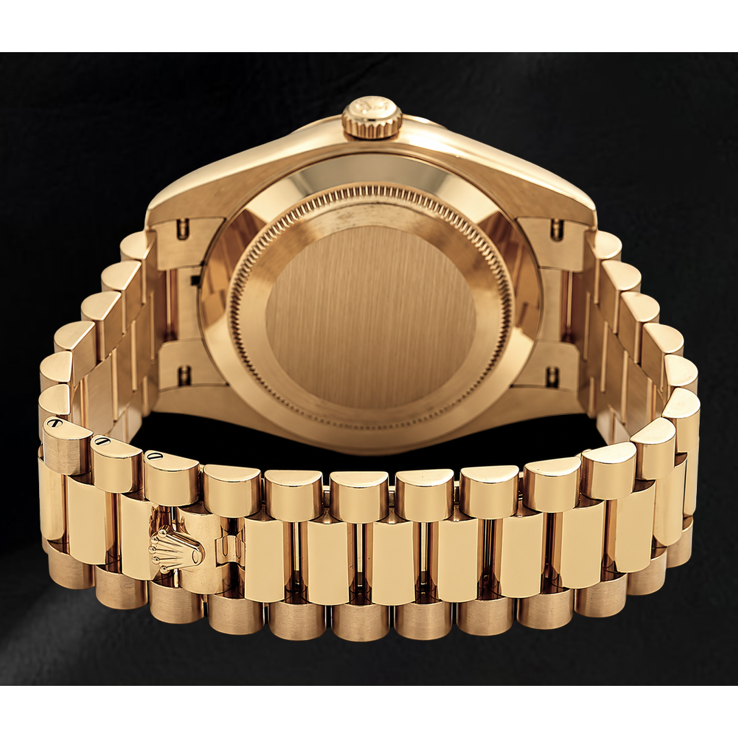 Orologio Rolex Day-Date 40 mm 228238 in Oro Giallo con Quadrante Argento con Motivo e Bracciale President