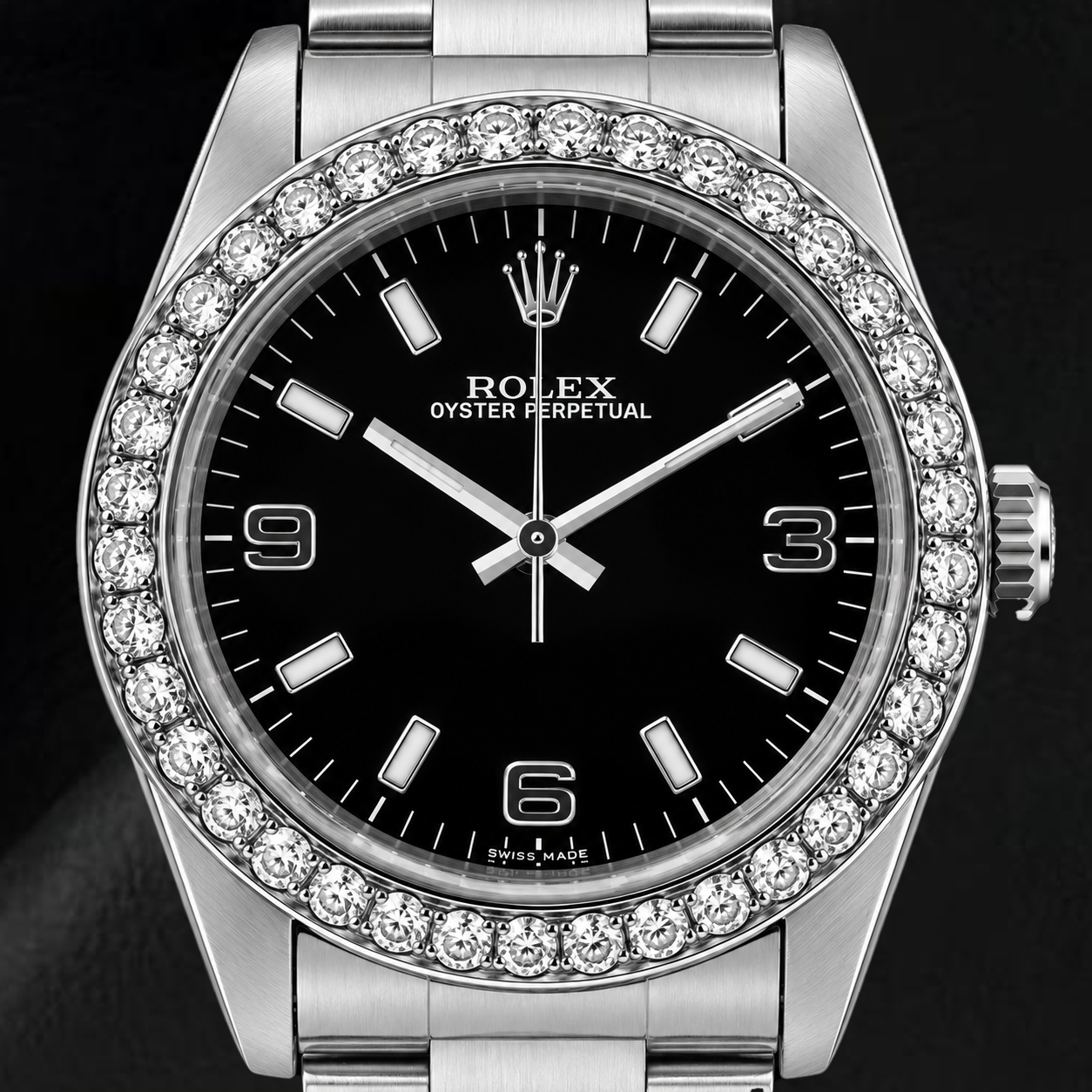 Orologio Rolex Oyster Perpetual 26mm 76030 con Quadrante Nero a Numeri Arabi e Lunetta con Diamanti