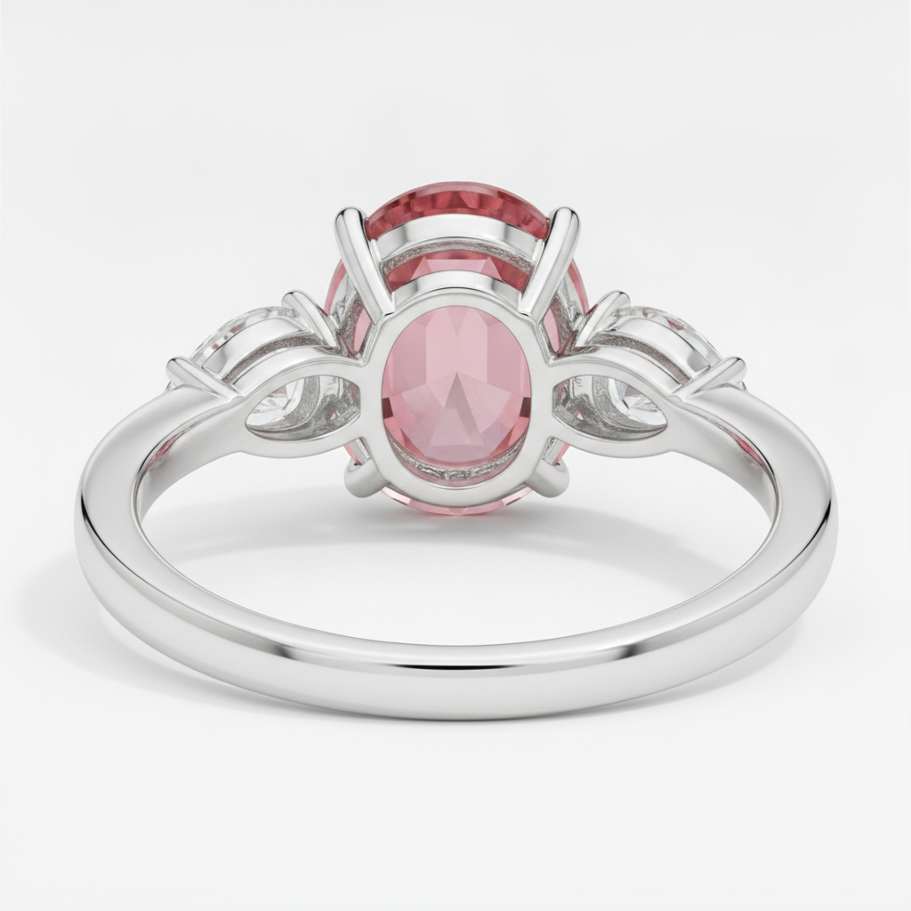 Anello di Fidanzamento con Zaffiro Pesca Padparadscha Naturale Ovale da 4,1 Carati a Tre Pietre in Platino