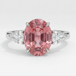 Anello di Fidanzamento con Zaffiro Pesca Padparadscha Naturale Ovale da 4,1 Carati a Tre Pietre in Platino