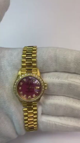 Orologio Rolex in stile presidente con quadrante in madreperla e diamanti, lunetta in oro