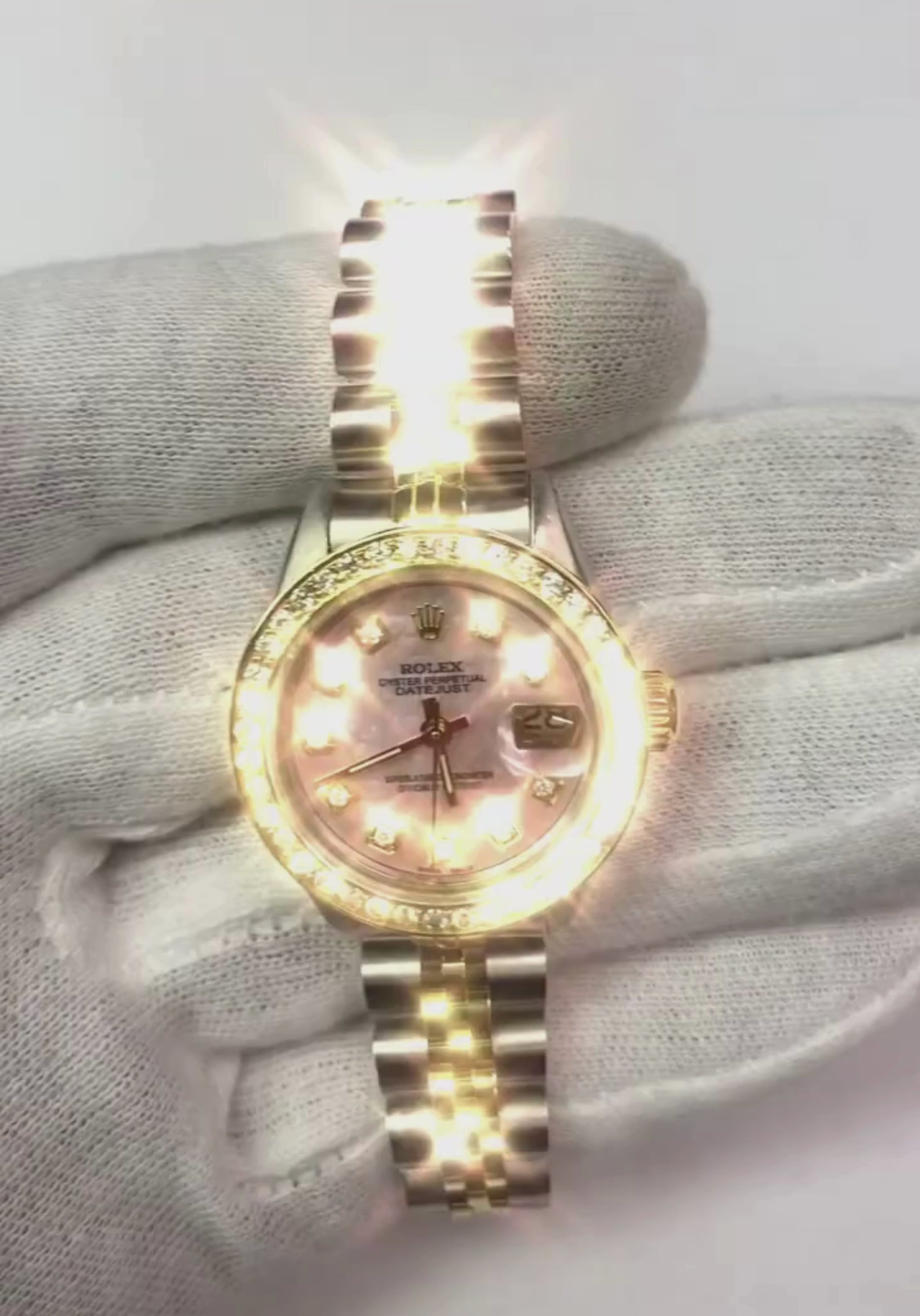 Orologio da donna con quadrante in madreperla rosa e diamanti Rolex Datejust bicolore