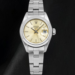 Rolex Date 79160 26 mm Orologio in Acciaio Inossidabile con Quadrante Champagne con Indici a Bastone e Lunetta Liscia