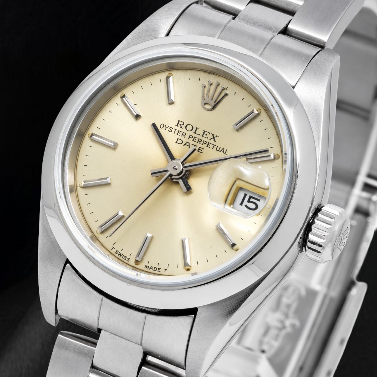 Rolex Date 79160 26 mm Orologio in Acciaio Inossidabile con Quadrante Champagne con Indici a Bastone e Lunetta Liscia