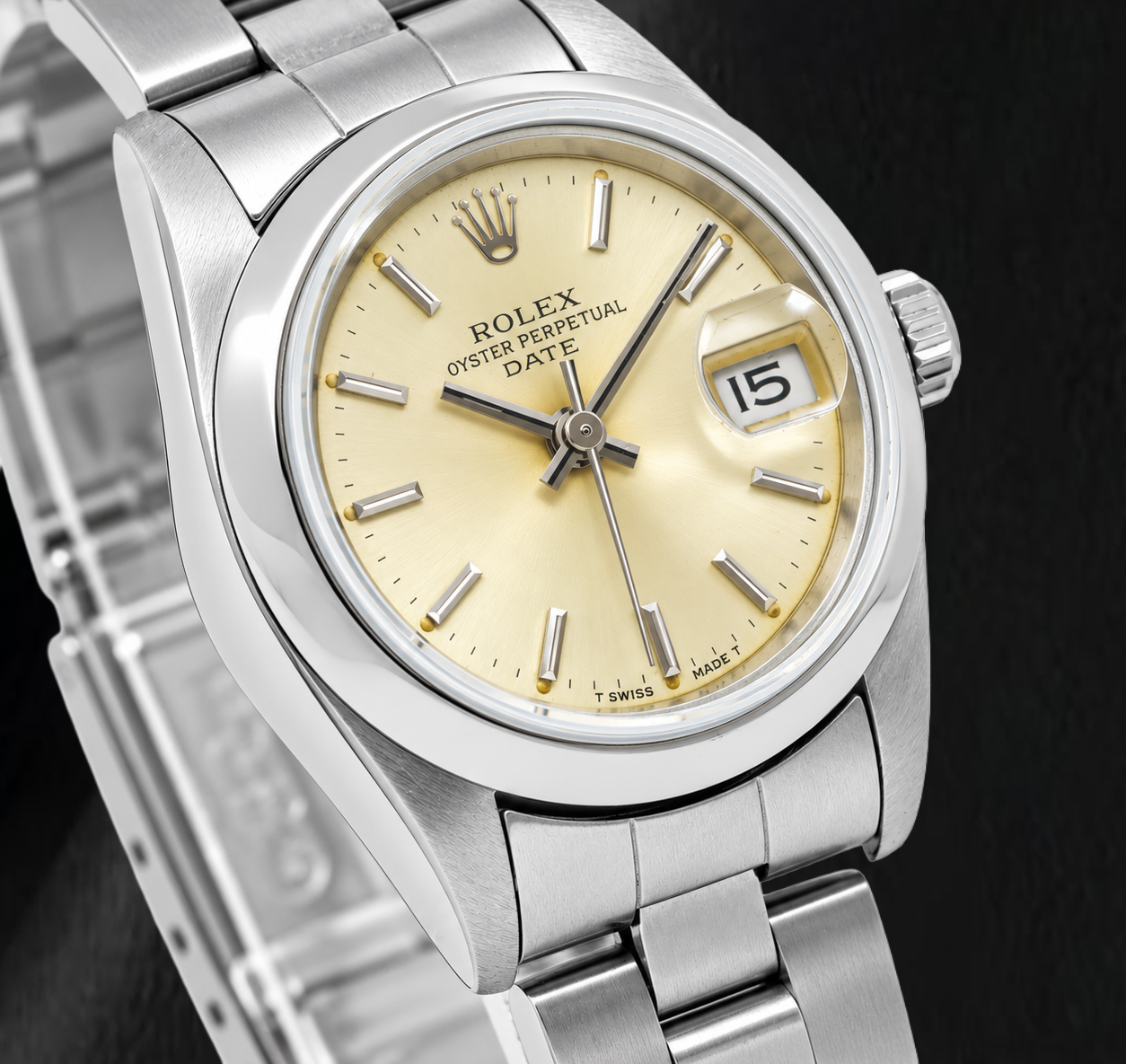 Rolex Date 79160 26 mm Orologio in Acciaio Inossidabile con Quadrante Champagne con Indici a Bastone e Lunetta Liscia