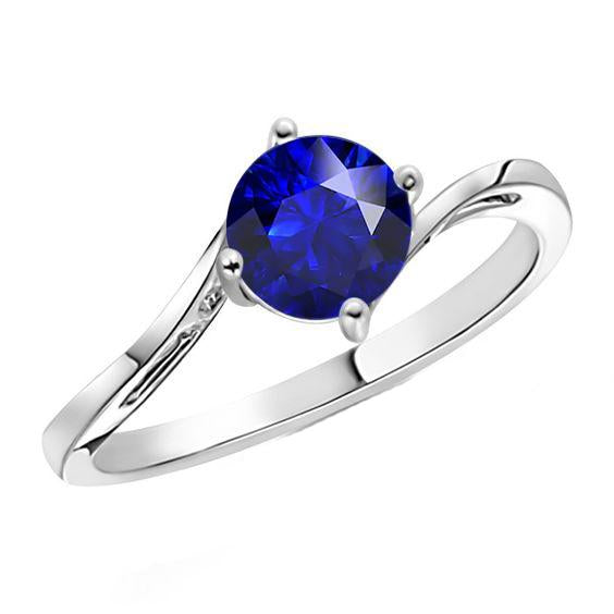 Anello solitario con zaffiro blu rotondo 2.50 carati con gambo a tensione - harrychadent.it