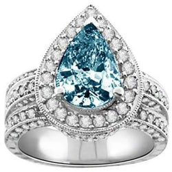 3 Ct. Anello con pera blu e diamanti rotondi bianchi in oro bianco 14K con pietre preziose