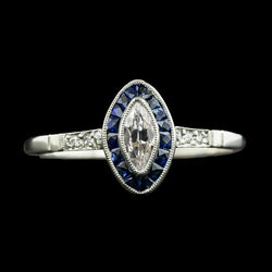 Anello Halo Marquise con diamanti a taglio antico e zaffiri trapezoidali 3 carati