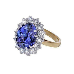 Anello Halo Oval Tanzanite AAA Diamanti 8.50 Carati Oro bicolore