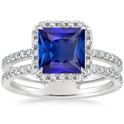 Anello Halo Princess Blue Sapphire Con Pave Diamond Accenti 6.50 Carati