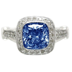 Anello Halo con cuscino da 5 carati in zaffiro blu e gioielli con diamanti