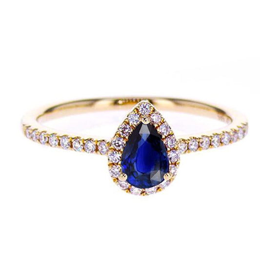 Anello in oro rosa con diamante Halo Zaffiro Ceylon blu profondo 2.50 carati - harrychadent.it