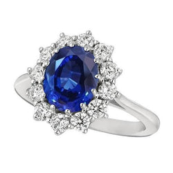 Anello Halo con zaffiro blu ovale e diamanti rotondi 6.50 ct. Oro bianco 14K