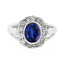 Anello Halo con zaffiro di Ceylon ovale da 4,50 carati e castone con diamanti