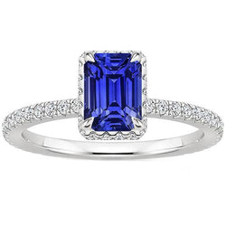 Anello Halo in oro bianco. zaffiro blu smeraldo e diamante 4.25 carati