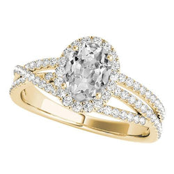 Anello Halo in oro ovale con diamante a taglio antico triplo gambo diviso 6.50 carati
