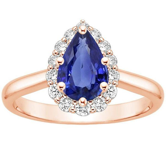 Anello Halo in oro rosa a forma di pera con zaffiro blu e diamanti 3.75 carati - harrychadent.it