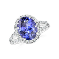 Anello Tanzanite Halo 6 Ct Con Diamanti Oro Bianco 14K