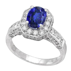 Anello Tanzanite Ovale e Diamanti Rotondi 3.61 Carati Oro Bianco 14K