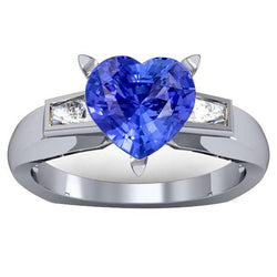 Anello a forma di cuore con 3 diamanti baguette e zaffiro blu 2.75 carati