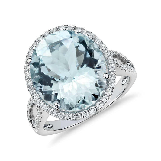 Anello a polo con acquamarina taglio rotondo 12 ct e diamanti in oro bianco - harrychadent.it