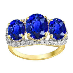 Anello anniversario 6 carati con diamanti ovali e zaffiro di Ceylon in oro bicolore