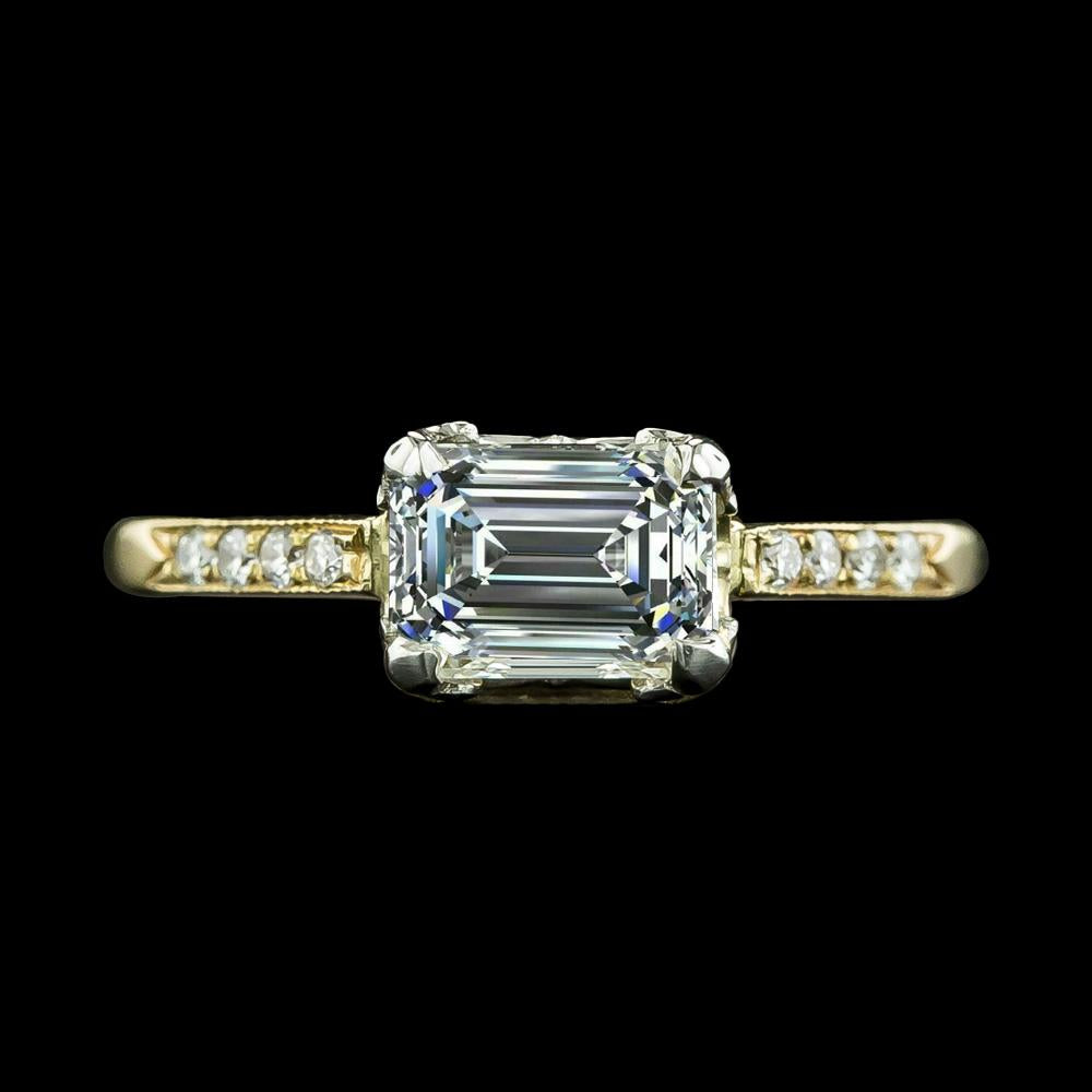 Anello anniversario con smeraldo e diamante rotondo 5 carati in oro bicolore - harrychadent.it