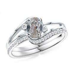 Anello con 3 diamanti a taglio ovale in stile vecchia miniera con gambo diviso 1.50 carati