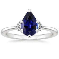 Anello con 3 pietre di diamanti e zaffiro blu 6.75 carati con gambo affusolato in oro