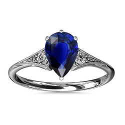 Anello con 3 pietre in stile antico con zaffiro blu pera e diamanti 3.25 carati
