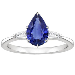 Anello con Zaffiro Blu Pera 3 Carati e Diamanti Baguette Tre Pietre in oro bianco 14 carati