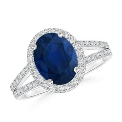 Anello con accenti di zaffiro blu ovale da 3,50 carati e diamanti in oro bianco 14 carati