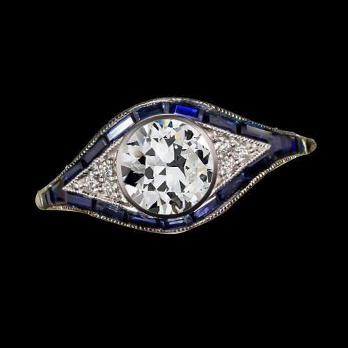 Anello con castone rotondo con diamanti taglio antico e zaffiro baguette 3 carati - harrychadent.it