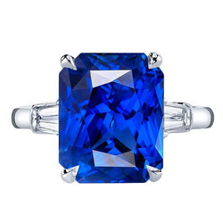 Anello con diamante artigli d'aquila incastonato con zaffiro blu radiante oro 7 carati 14K