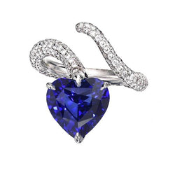 Anello con diamanti a forma di cuore con zaffiro blu. stile intrecciato. 5 carati