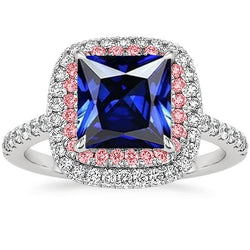 Anello con gemme e diamanti. zaffiro blu e rosa. doppio alone. 6.50 carati d'oro
