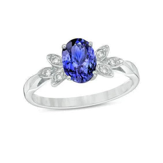 Anello con tanzanite e diamanti da 2,05 carati in oro bianco 14K - harrychadent.it