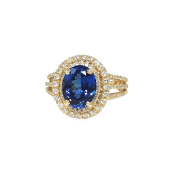 Anello con tanzanite ovale blu e diamante in oro giallo da 6 carati 14 carati