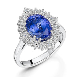 Anello Con Tanzanite Ovale Da 4.90 CT E Diamanti in Oro Bianco 14 Carati
