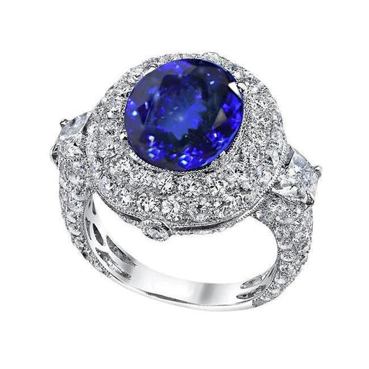 Anello con tanzanite ovale e diamanti da 6,01 ct in oro bianco 14K - harrychadent.it