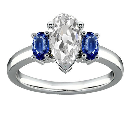 Anello con tre pietre di zaffiri blu ovali con diamanti a pera taglio antico 3.50 carati - harrychadent.it