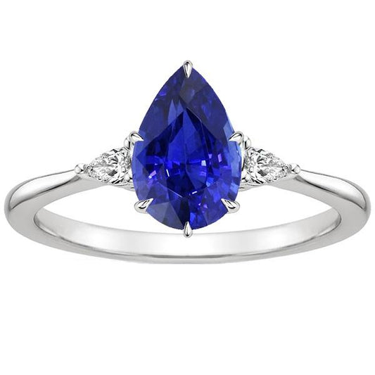 Anello con tre pietre preziose. pera. zaffiro di Ceylon e diamanti. 4.25 carati - harrychadent.it