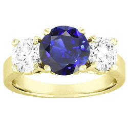 Anello con zaffiri blu 5 carati e diamanti con tre pietre tonde