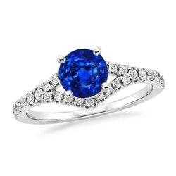 Anello con zaffiro Ceylon da 4,35 carati e diamanti incastonati in oro bianco 14K