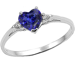 Anello con zaffiro a cuore da 1,75 carati dello Sri Lanka e tre pietre di diamanti tondi