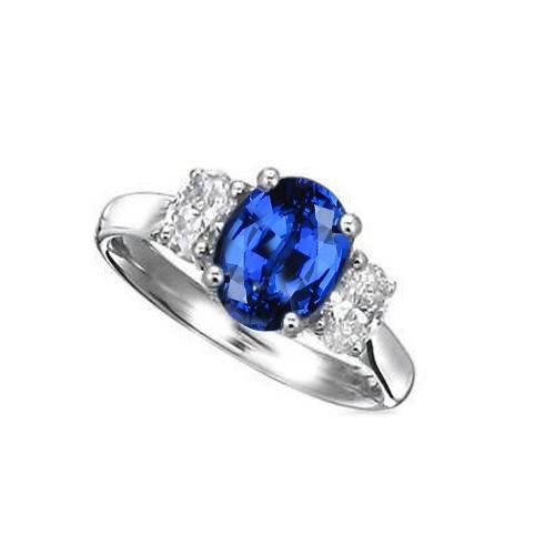 Anello con zaffiro blu dello Sri Lanka e diamanti 3 pietre 2.60 carati WG 14K - harrychadent.it